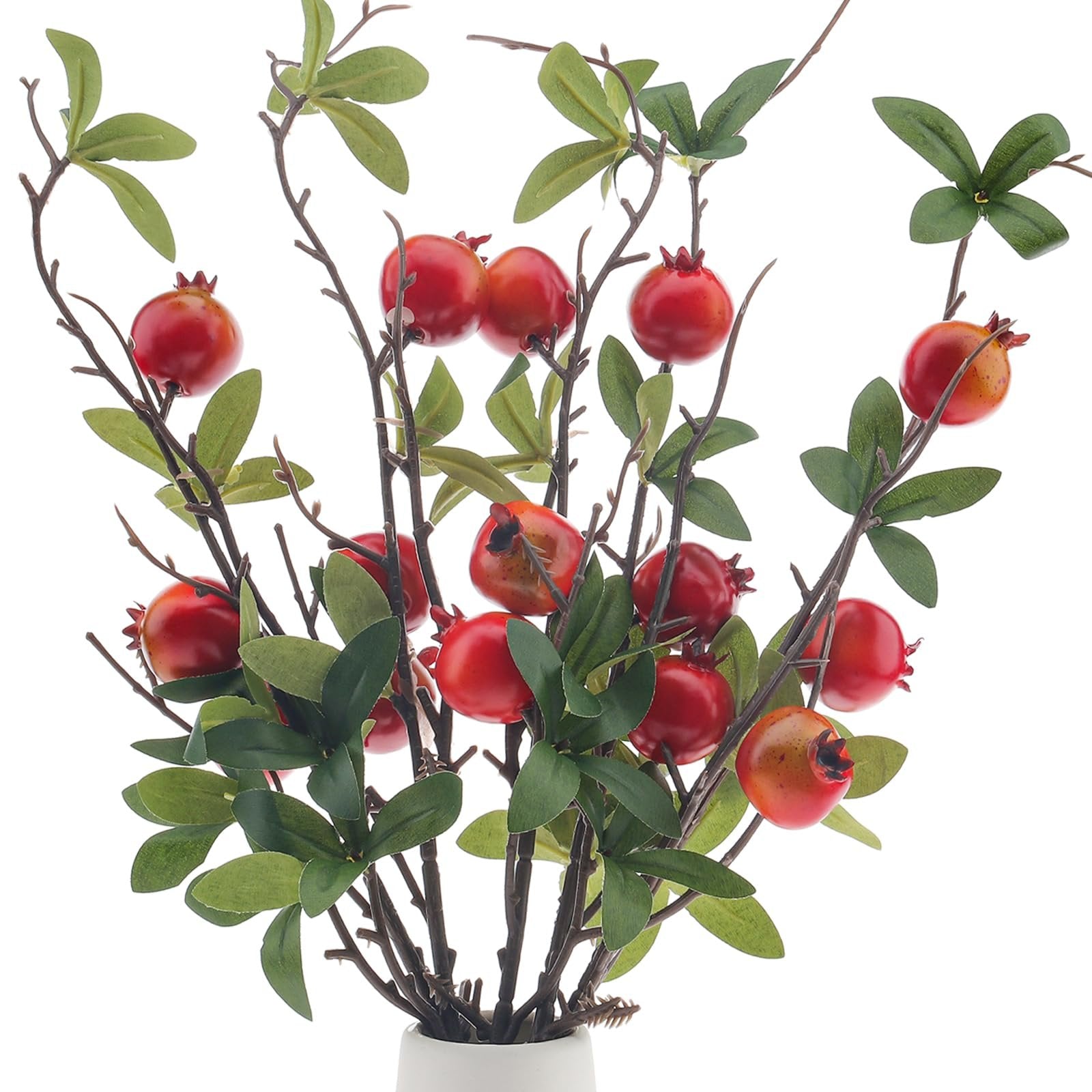 Artificial pomegranate branches with red fruits and green silk leaves in a white vase