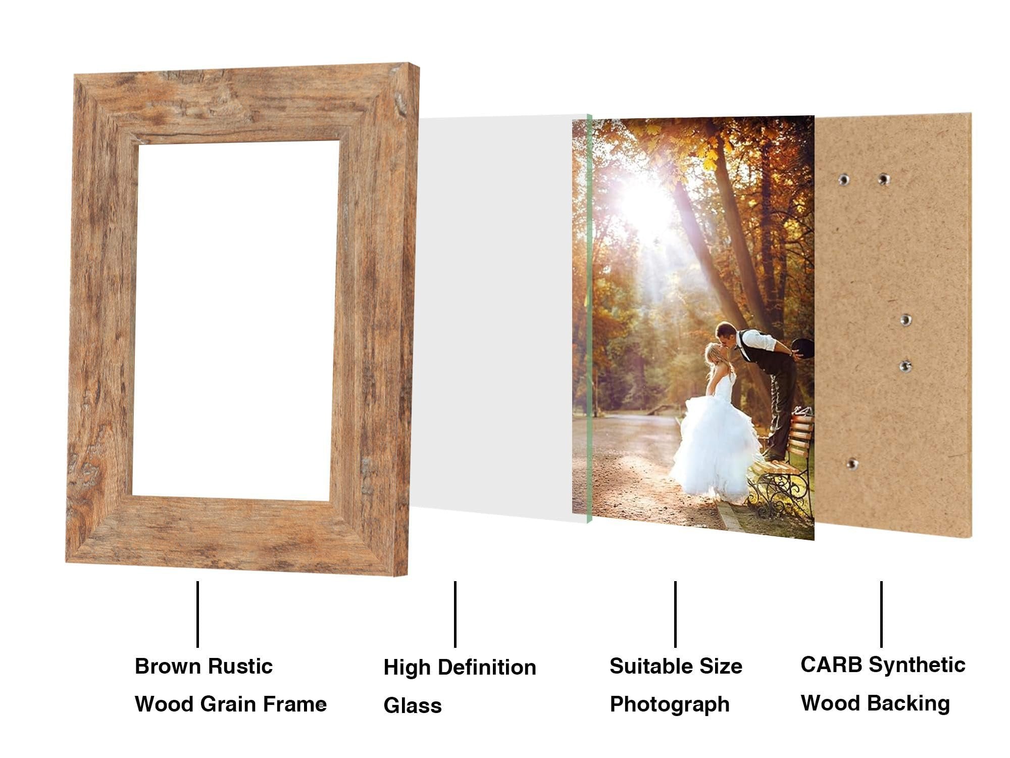Exploded view of a rustic brown picture frame showing its components: wood grain frame, glass, photograph, and wood backing.