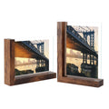 Two wooden-based glass picture frames displaying a bridge scene, one horizontal and one vertical.