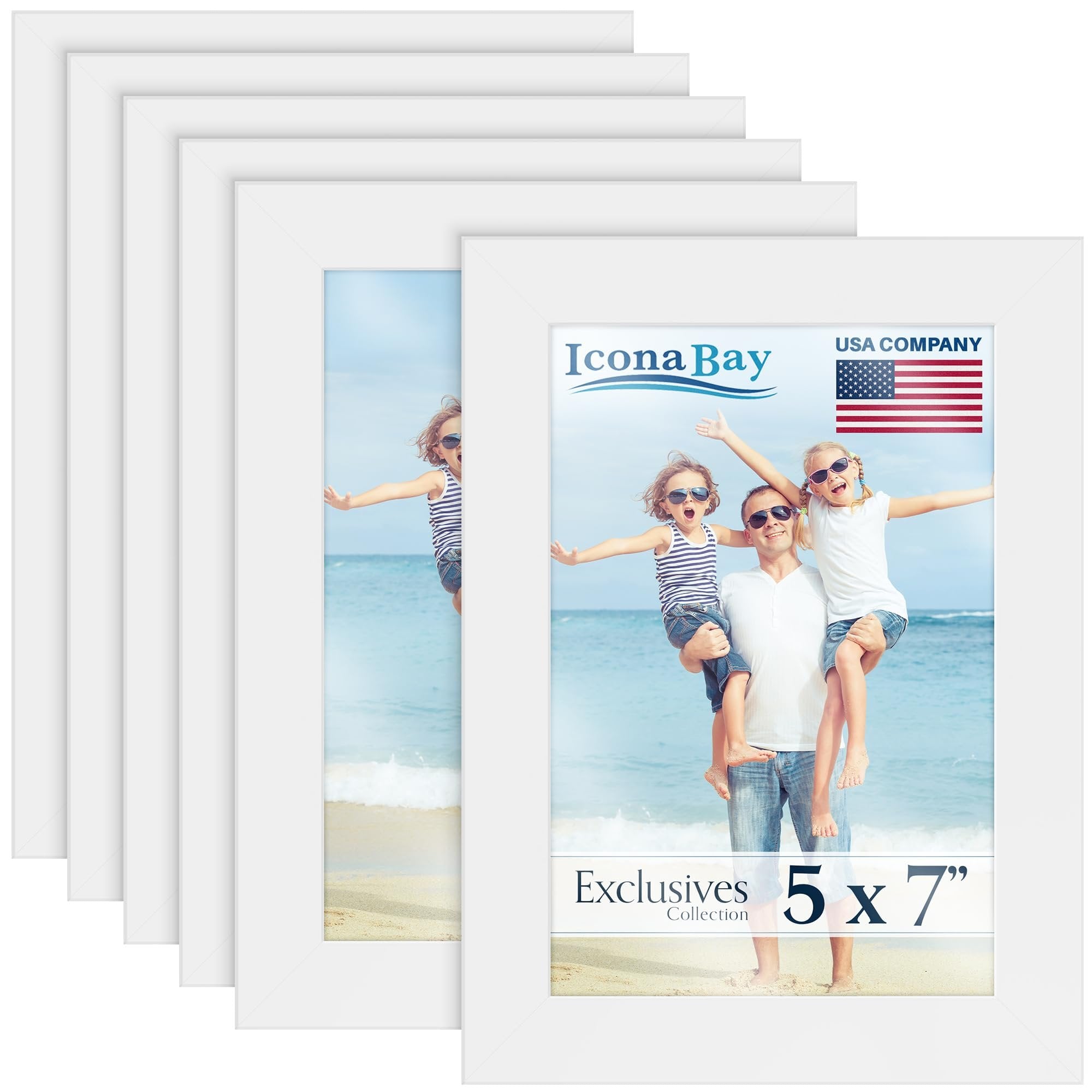 Six white 5x7 picture frames stacked, one showing a family on a beach.