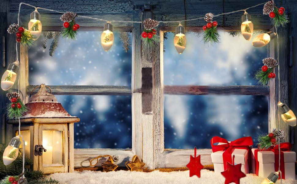 Christmas window scene with snow, pine garland lights, lantern, and gifts