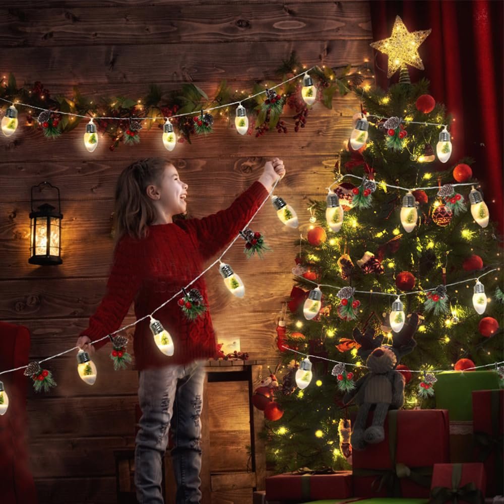 Girl decorating a Christmas tree with pine garland string lights featuring pinecones and berries