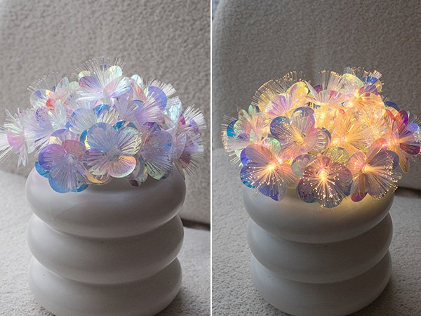 Fiber optic flower string lights in a white vase, shown unlit and lit with warm white lights.