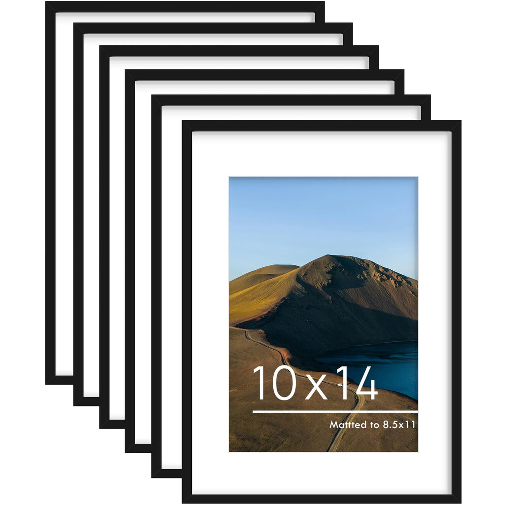 Six black wood picture frames arranged in a staggered pattern, one frame displays a landscape photo with text.