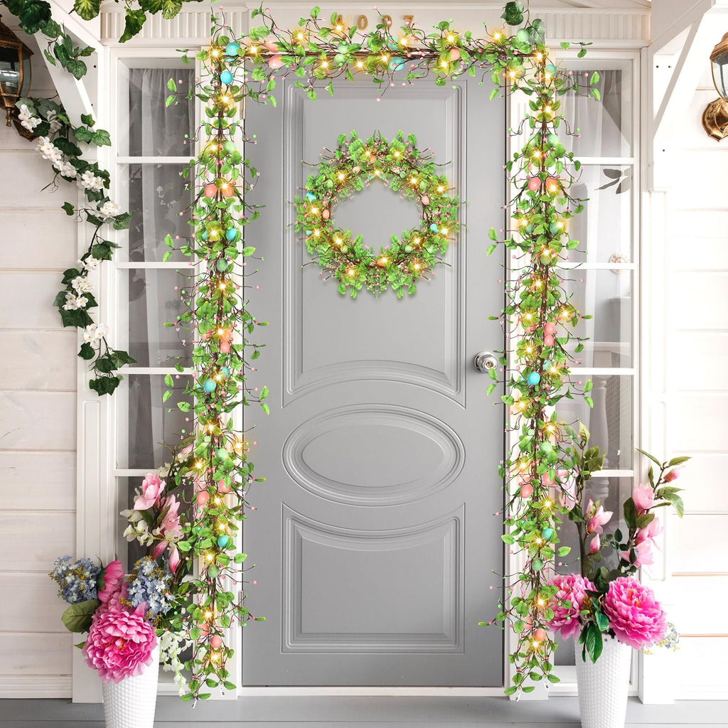 Easter egg garland and wreath with LED lights decorating a gray front door and porch