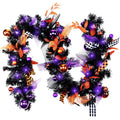 Halloween garland with black tinsel, purple and orange ornaments, and LED lights
