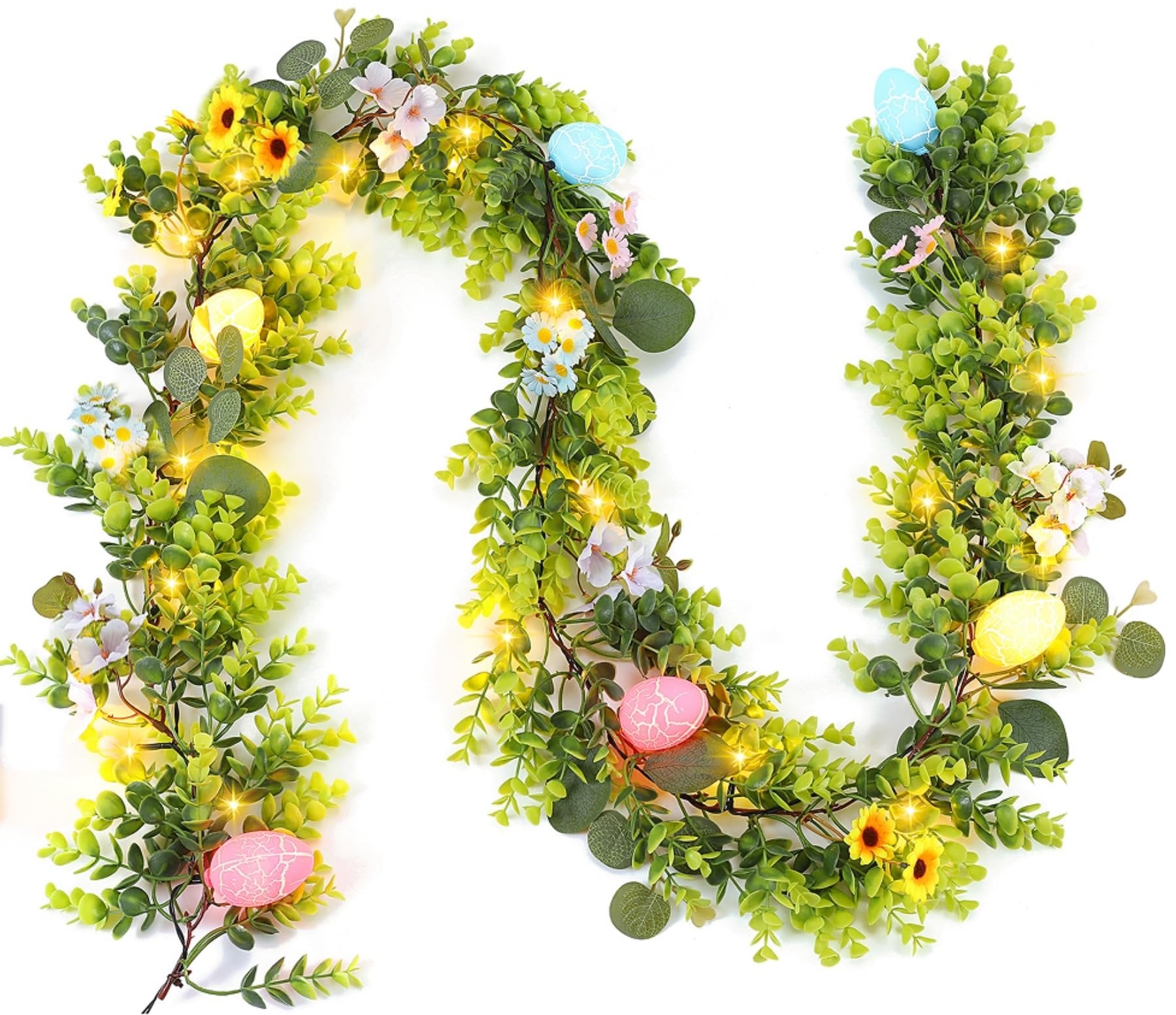 Easter garland with eucalyptus leaves, daisies, pink blossoms, decorative eggs, and warm white LED lights on a white background.