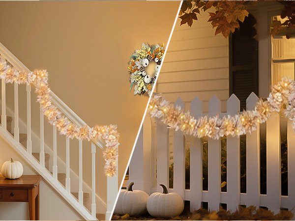 Fall garland with warm white LED lights draped on a staircase railing and a white picket fence.