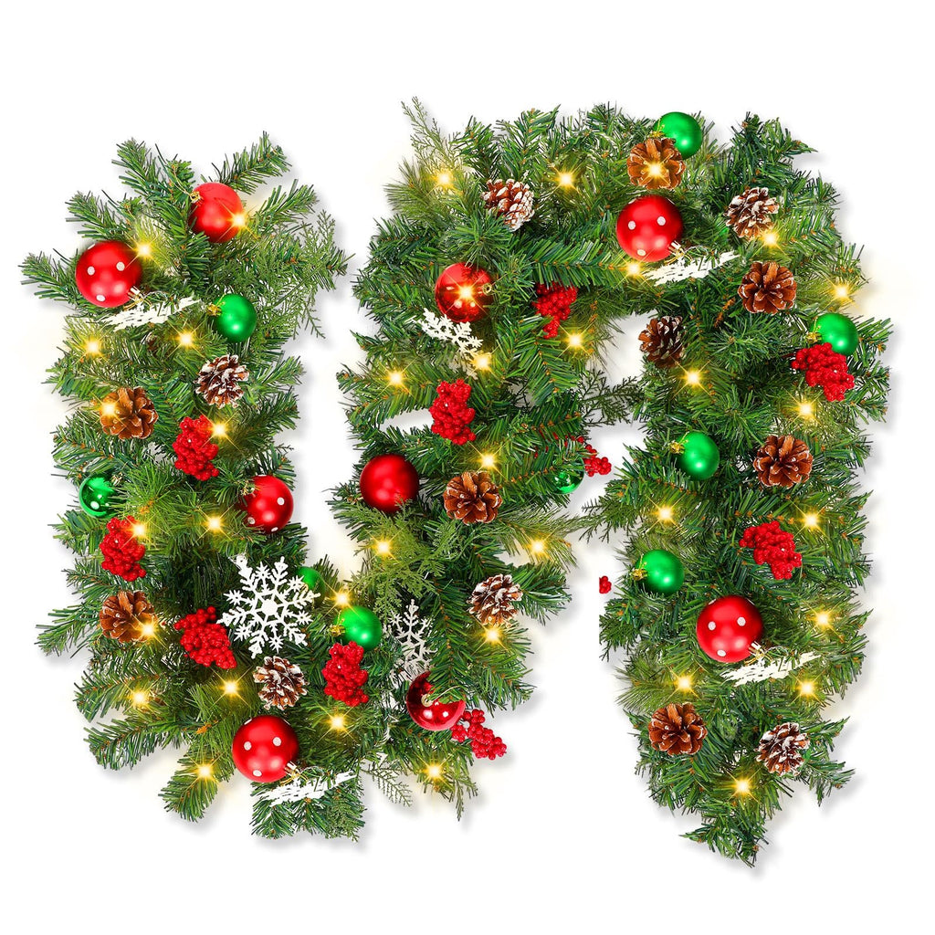 Christmas garland with warm white LED lights, pinecones, red and green ornaments, and snowflakes on a white background.