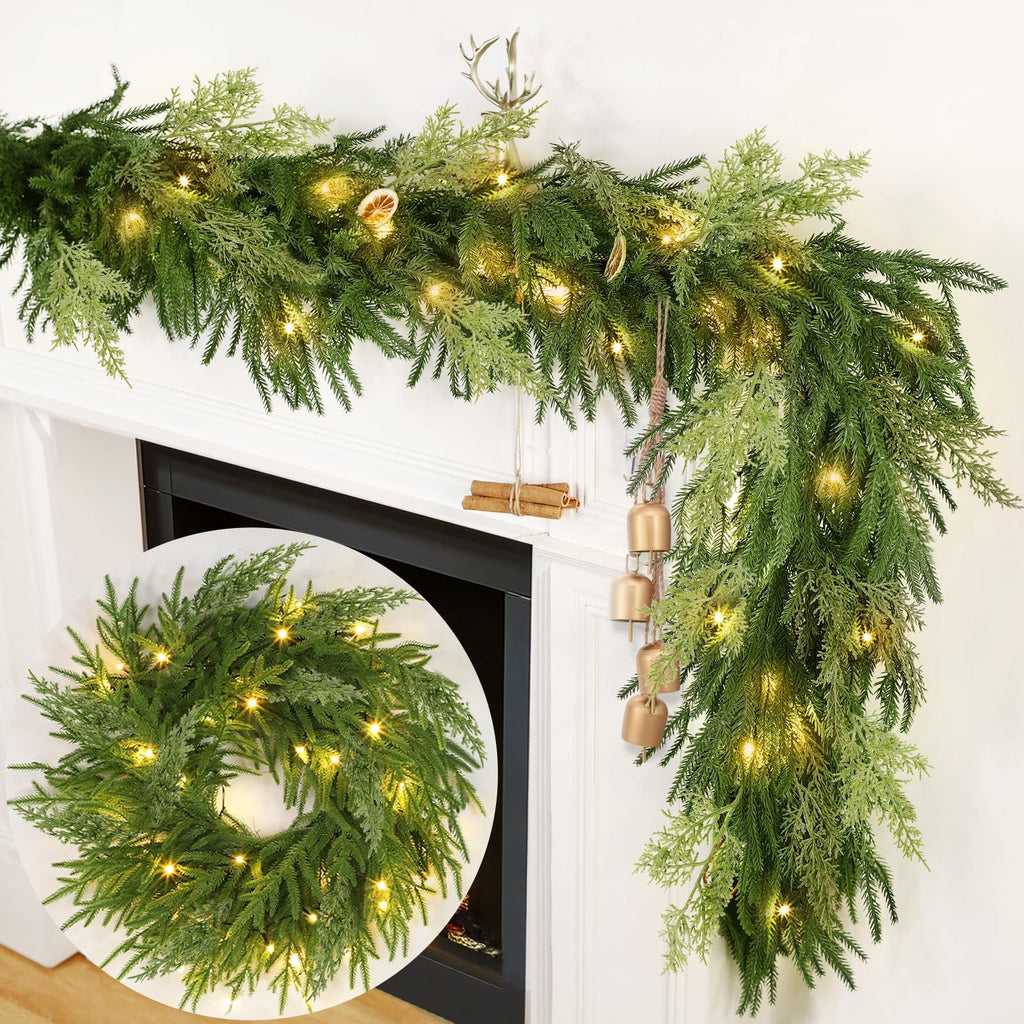 Prelit Christmas garland with warm LED lights draped over a white mantle, featuring a circular inset of a matching wreath.