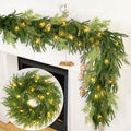 Prelit Christmas garland with warm LED lights draped over a white mantle, featuring a circular inset of a matching wreath.