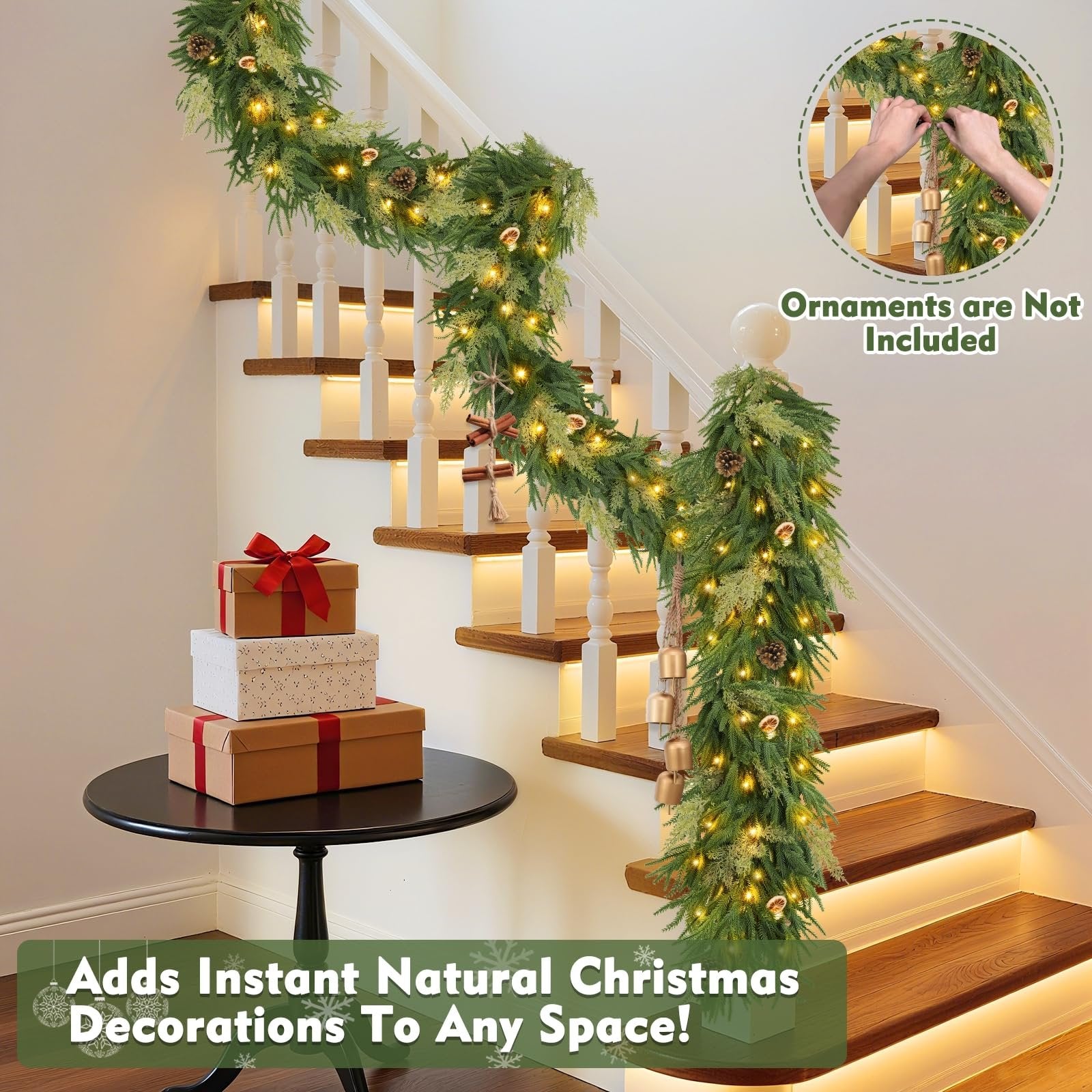 Prelit Christmas garland with lights and pinecones draped on a staircase with gift boxes on a table