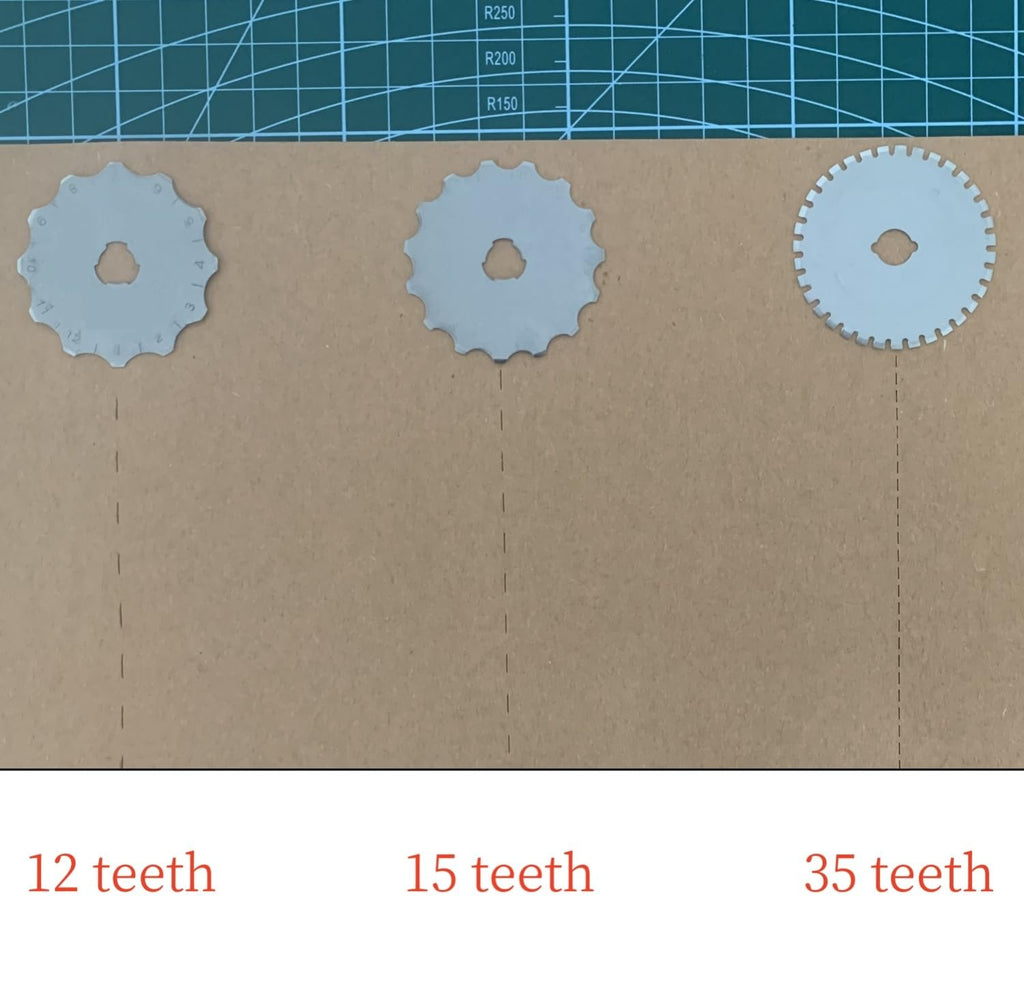 Three rotary cutter blades with different teeth counts: 12, 15, and 35, laid out on a brown surface with a cutting mat in the background.