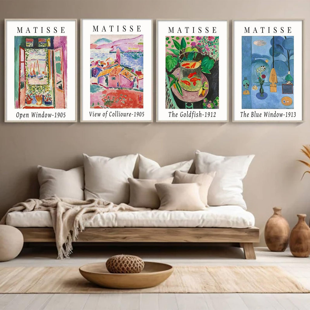 Four framed Matisse art prints displayed above a sofa in a living room setting.
