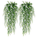 Two artificial hanging flower garlands with white blossoms and green eucalyptus vines against a white background.