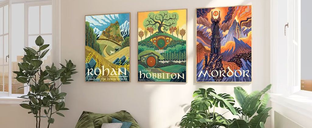 Three framed abstract landscape art prints depicting Rohan, Hobbiton, and Mordor, displayed on a wall with plants and a window.