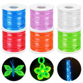 Six spools of glow-in-the-dark plastic lacing cord in blue, purple, white, red, orange, and green, with three circular insets showing crafts made from the cord.