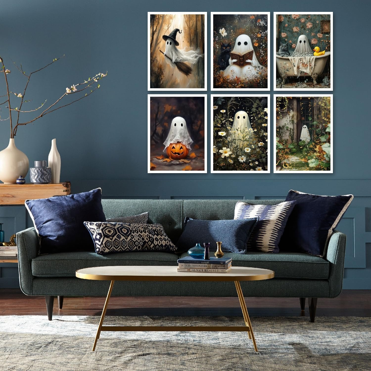 Six framed Halloween ghost diamond art paintings displayed on a wall above a sofa.