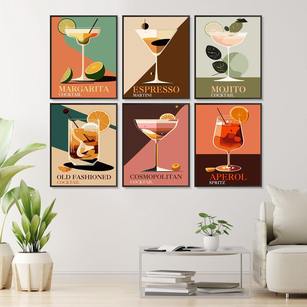 Six framed cocktail art prints displayed on a wall above a modern coffee table.