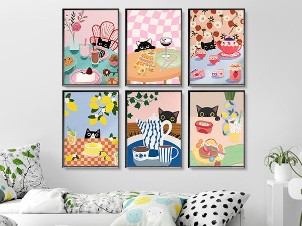 Six framed art prints featuring black cats and food scenes, displayed on a wall above a sofa.