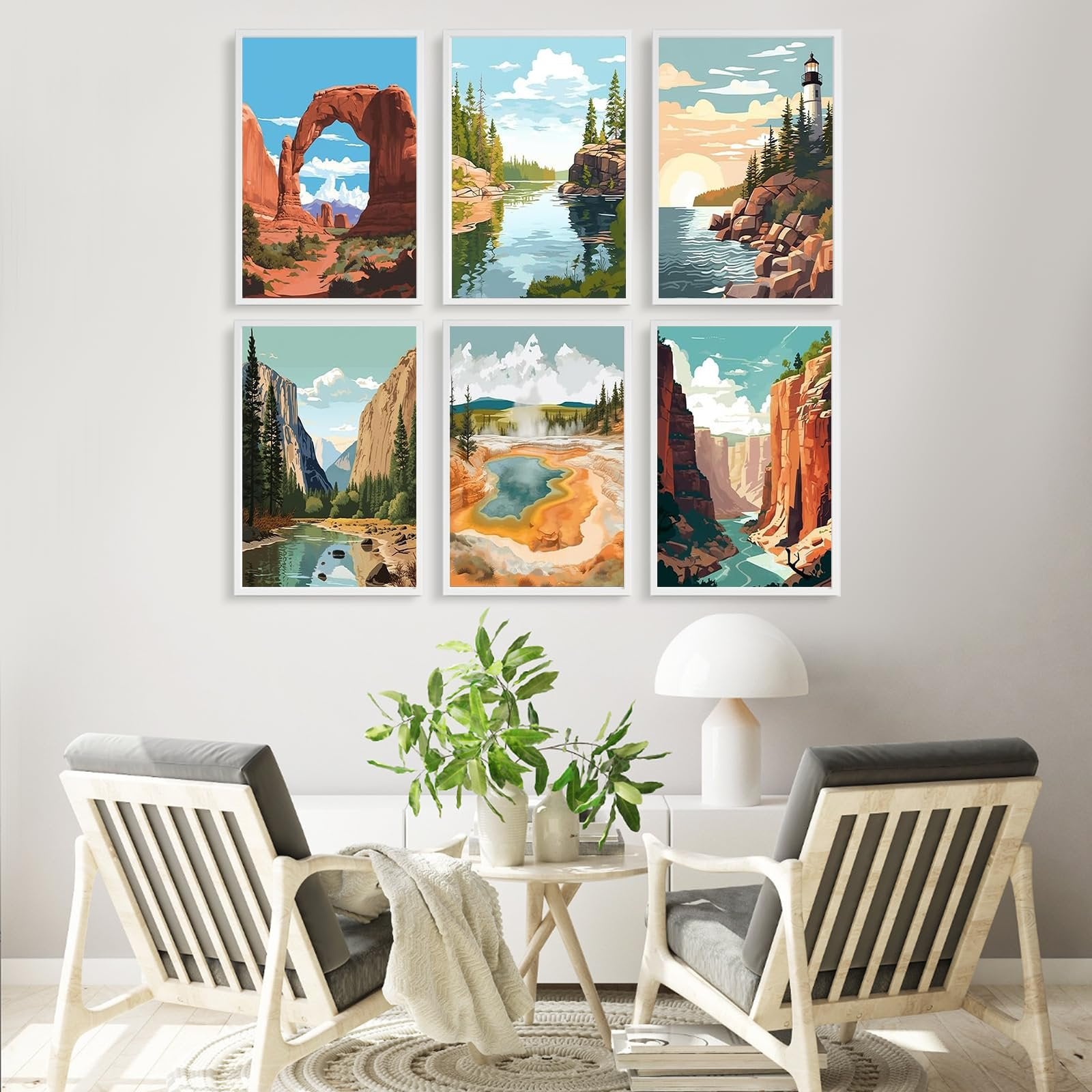 Six framed national park landscape paintings displayed on a wall above two chairs and a table.