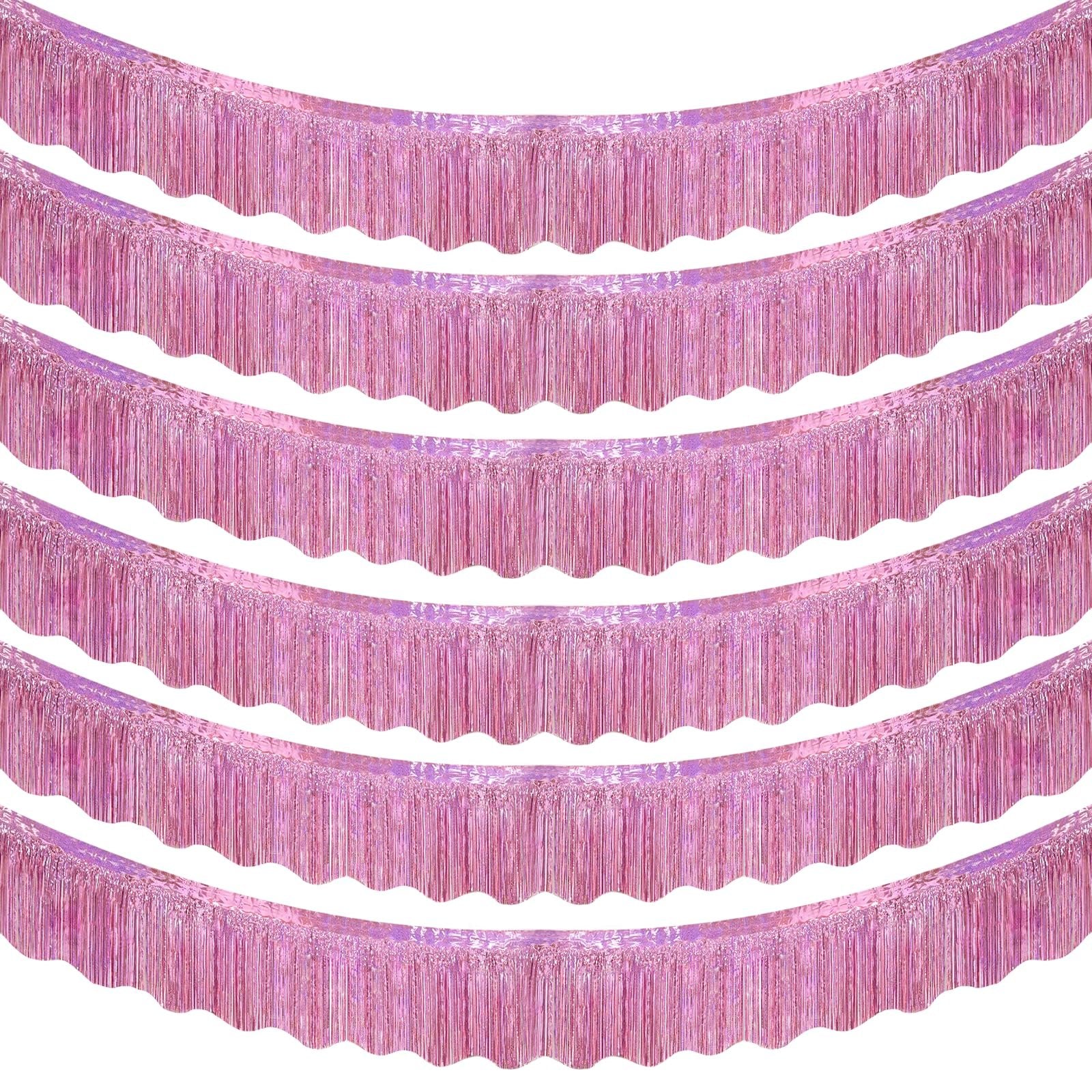 Six pink foil fringe garlands arranged in rows against a white background.