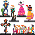 Day of the Dead wooden centerpiece set with figures, a cross, and text.