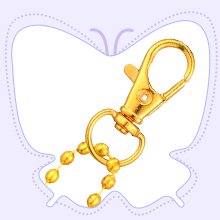 Gold metal keychain clasp with beaded chain, set against a light purple butterfly outline.
