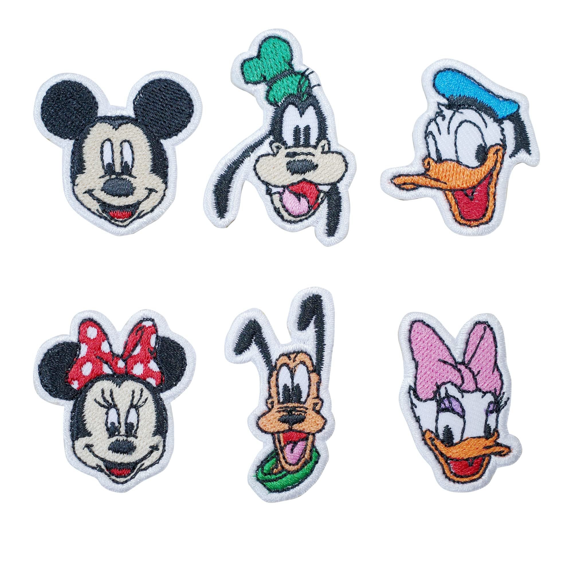 Six cartoon character iron-on patches: Mickey Mouse, Minnie Mouse, Goofy, Donald Duck, Daisy Duck, and Pluto.