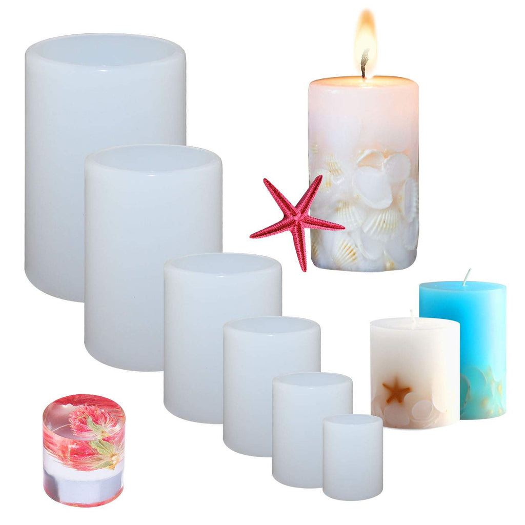 Set of six graduated cylinder silicone molds and three finished candles, one lit, on a white background.