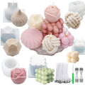Assortment of silicone candle molds and finished candles in various shapes including rose, geometric, and bubble designs, with wicks and tools.