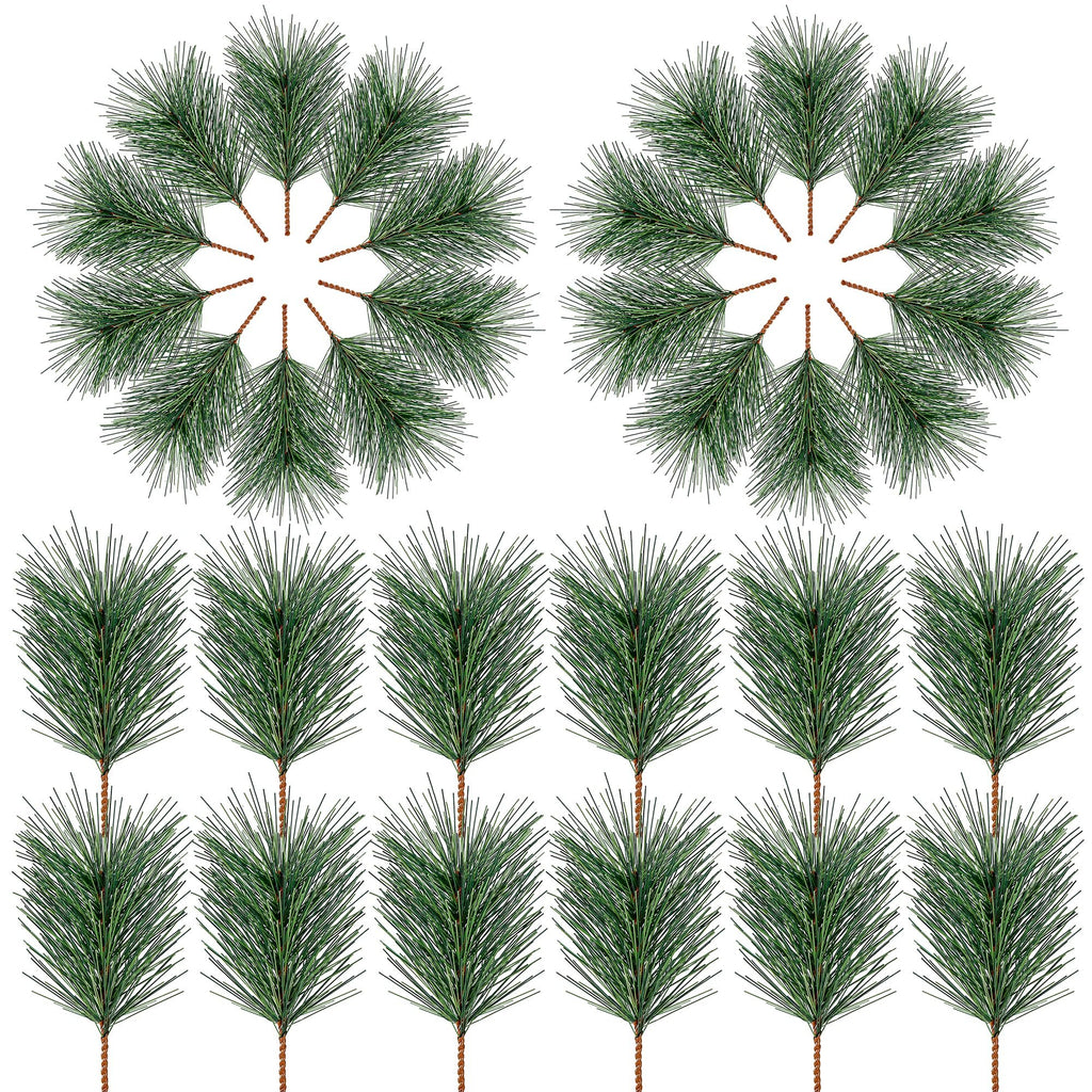 Artificial green pine needles arranged in two circular patterns and a grid of ten individual picks on a white background.