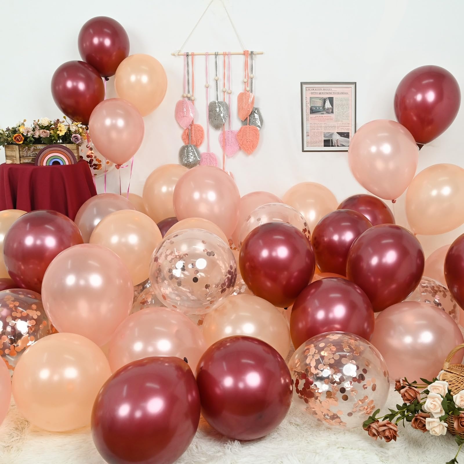 Assortment of burgundy, rose gold, wine red, and champagne latex balloons with confetti balloons.