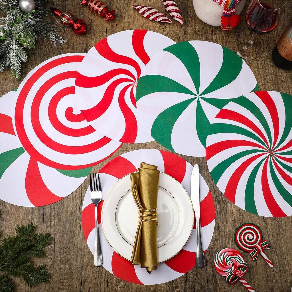 Christmas candy paper round placemats arranged on a wooden table with festive decorations
