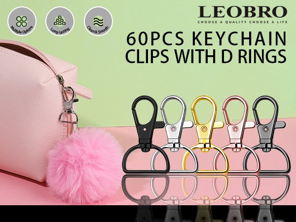 Set of 60 keychain clips with D-rings in various colors, displayed with a pink makeup bag and pom-pom.