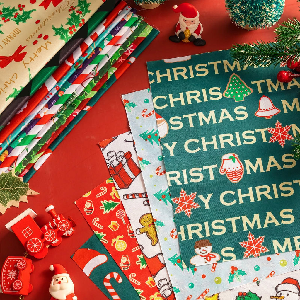 Stack of Christmas-themed fabric squares with various holiday prints like snowmen, trees, and candy canes, arranged on a red surface with festive decorations.