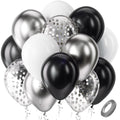 Cluster of black, white, and metallic silver balloons with confetti-filled clear balloons and a roll of tape.