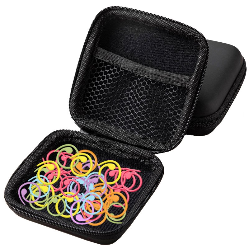 Open black storage case filled with colorful stitch markers and row counters