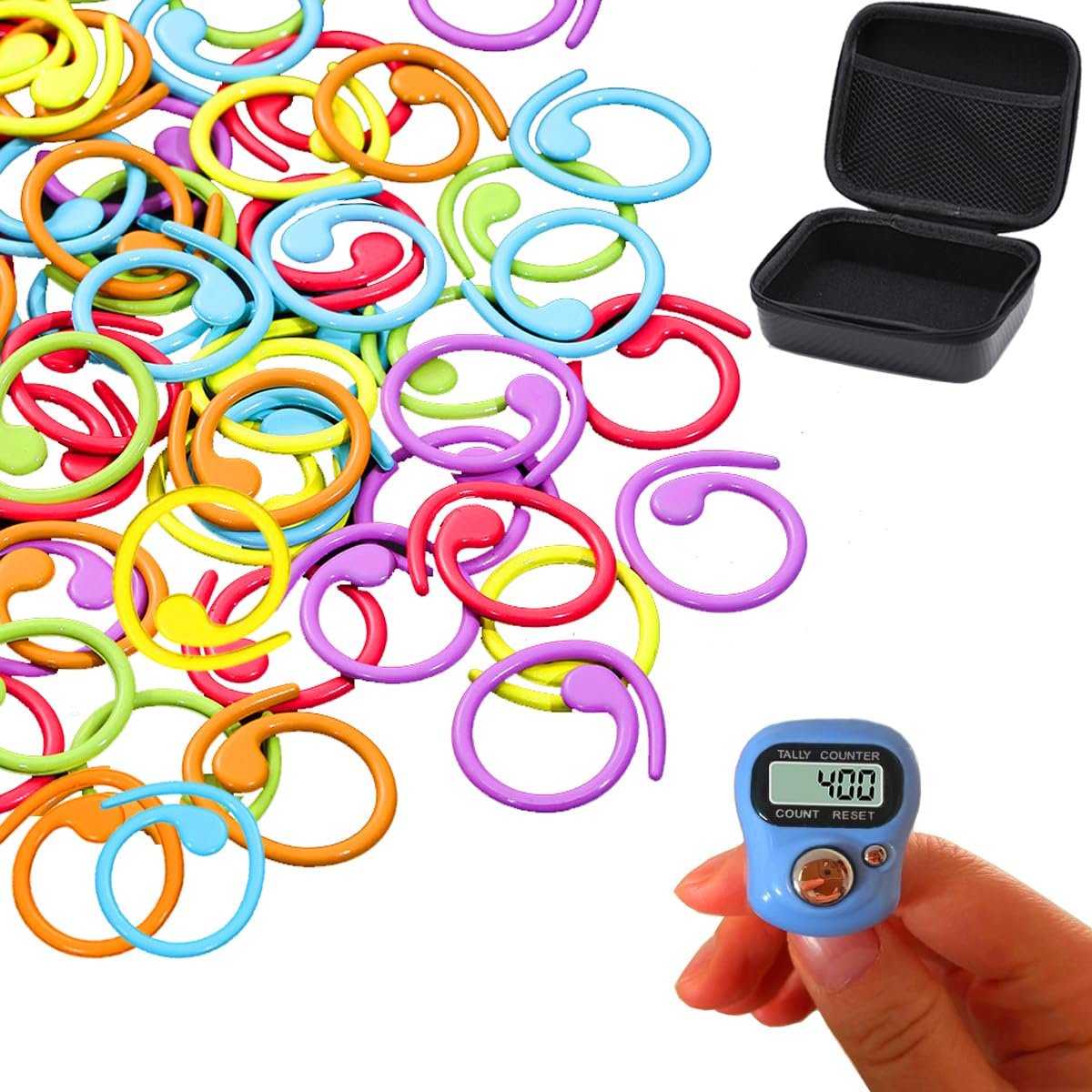 Pile of colorful stitch markers and a blue digital row counter held by a hand, with an open black case nearby.