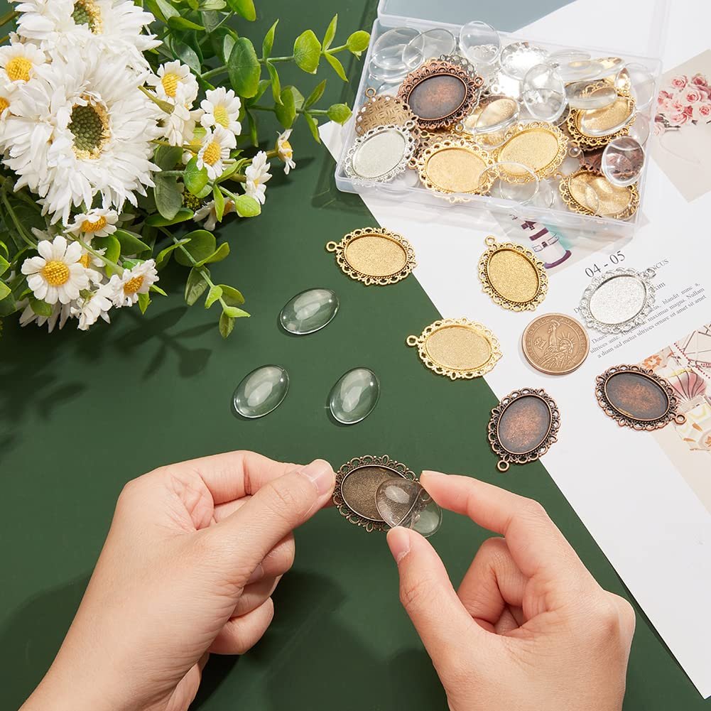 Hands assembling oval pendant tray with glass cabochon dome tiles, surrounded by jewelry findings and decorative flowers.