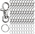 Silver lobster claw clasps and key rings for jewelry making, shown from a top-down perspective.