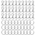 Silver metal lobster claw clasps and split rings for jewelry making and crafts, arranged in rows.
