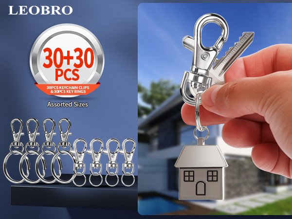 Keychain making kit with swivel snap hooks and split rings, one shown with a key and house charm.
