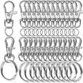 Silver zinc alloy swivel snap hooks and split rings for keychain making, arranged in rows on a white background.