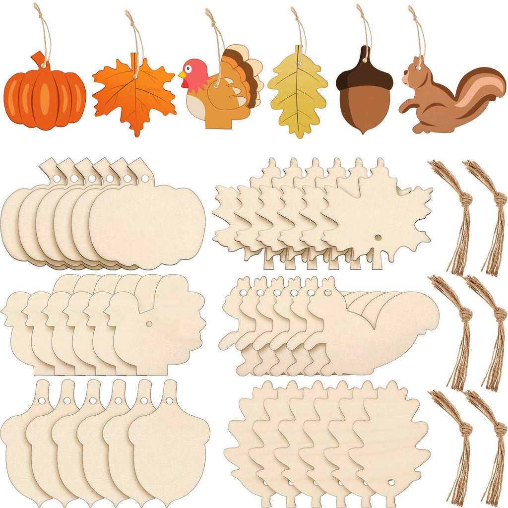 Collection of unfinished wood Thanksgiving ornaments in various shapes including pumpkins, leaves, turkeys, acorns, and squirrels, with hanging holes and twine.