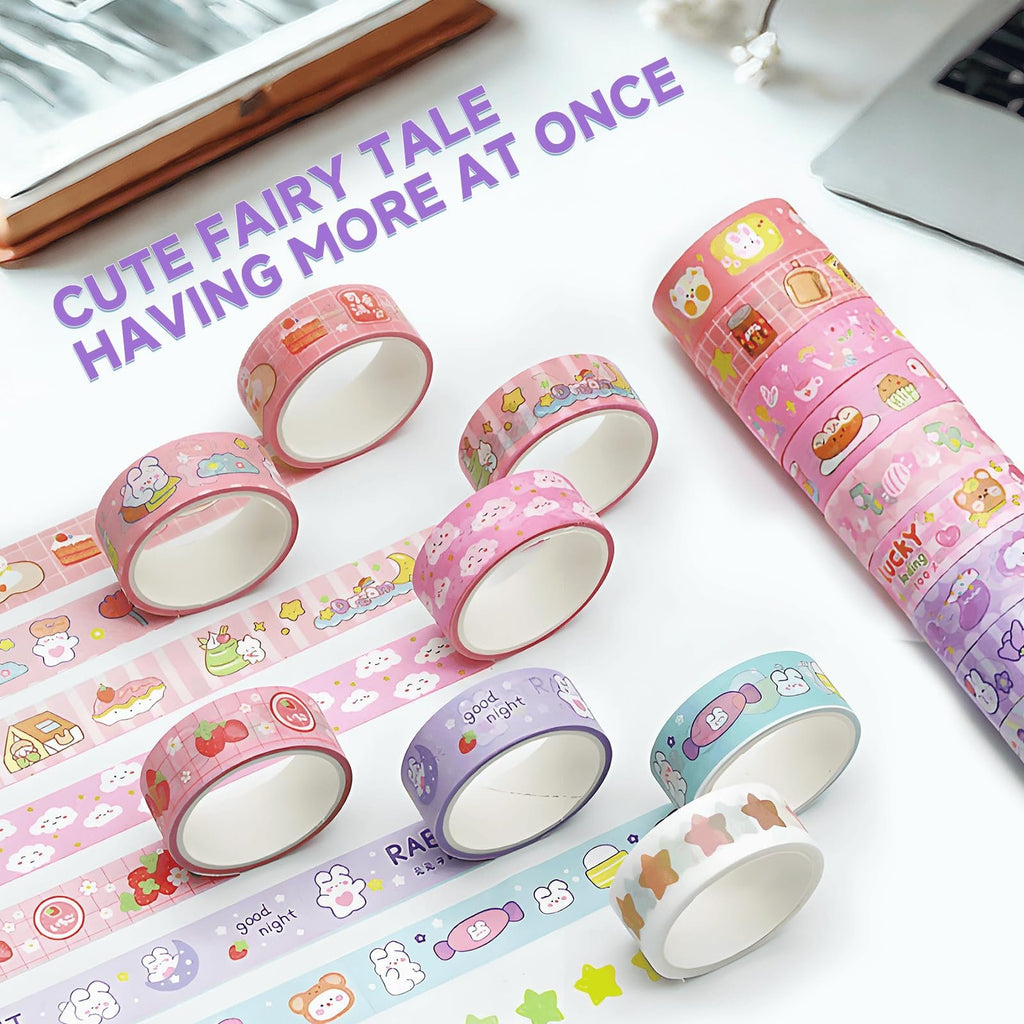 Several rolls of decorative washi tape with colorful cartoon patterns are scattered on a white surface, with a laptop in the background.