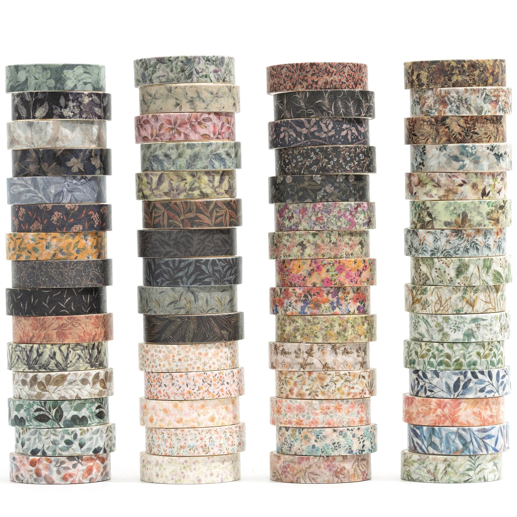Stacks of washi tape rolls with floral and leaf patterns on a white background.
