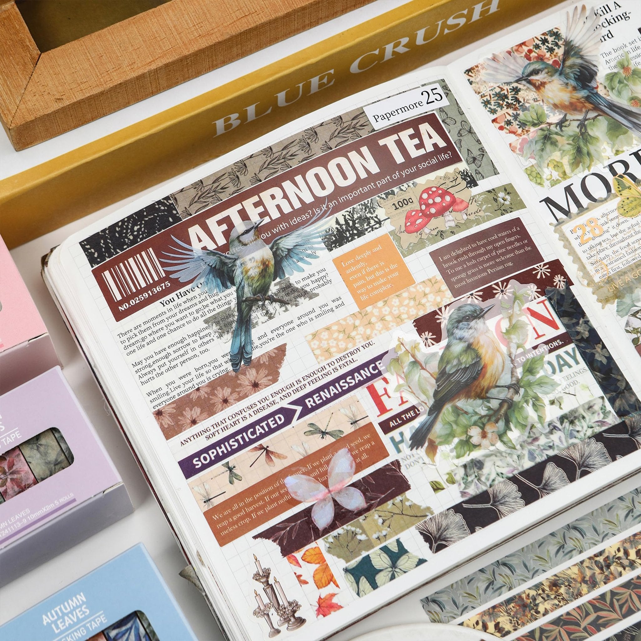 Journal spread decorated with various floral and nature-themed washi tapes, featuring birds, butterflies, and text.