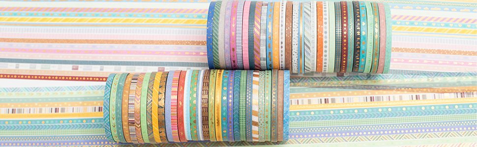Two stacks of skinny gold foil washi tape rolls with various patterns and colors, displayed on a striped background.