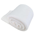 Rolled white 100% natural cotton quilt batting on a white background, showing texture and thickness.